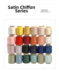 Chiffon satin ribbon rolls with frayed edges on wooden spools in 24 colors