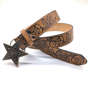 Vintage western brown belt featuring embossed roses and a large metal star buckle