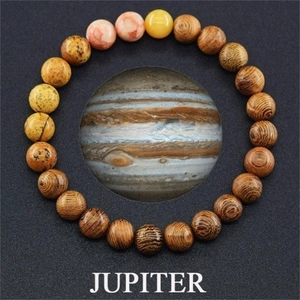 Detail of beaded Jupiter solar system bracelet with natural tiger eye and wooden texture stones
