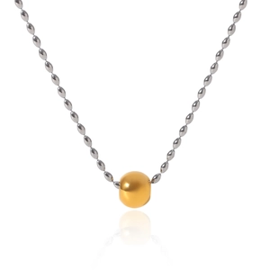 Detail showing two-tone beaded Y-necklace with gold spherical pendant on silver chain