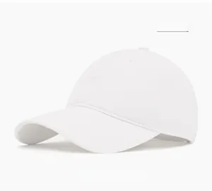 Close-up of white cotton baseball cap with six-panel structure and breathable eyelets