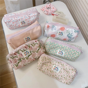 Variety of floral cotton pencil cases and makeup bags with tulip prints and zippers