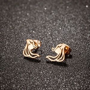 Minimalist gold hollow abstract earrings with sleek metallic finish on a dark background
