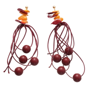 Statement Bohemian resin earrings with red beaded tassels and geometric acrylic discs