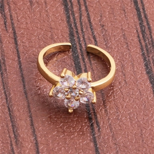 Adjustable gold flower ring with sparkling zircon stones in a floral petal design