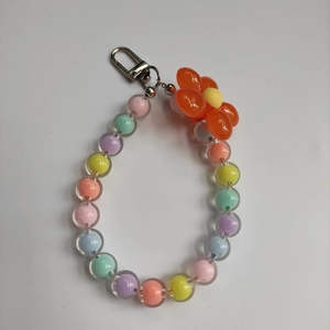 Pastel beaded mobile phone strap with colorful candy beads and orange floral charm