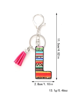 Detailed view of rainbow and leopard print letter L keychain with pink tassel and measurements