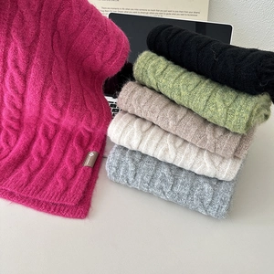 Chunky cable knit wool scarf in candy colors featuring soft mohair texture and logo tag