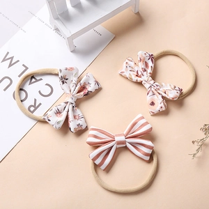 Set of three floral and striped bow headbands with soft elastic nylon for infants