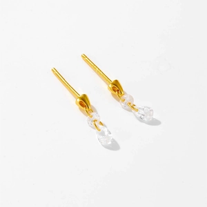 Elegant gold S925 silver earrings with pear-shaped clear zircons on a white background