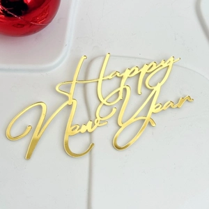 Golden acrylic Happy New Year cake topper with a mirrored finish for festive baking decor