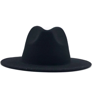 Front detail of a classic black wide brim wool fedora hat with smooth felt texture