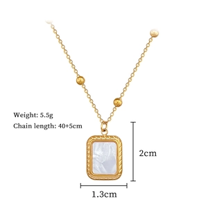 Detail view of gold square shell pendant necklace with size and weight dimensions