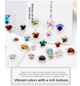 Detailed view of colorful heart crystal pendants with gold copper edges for DIY jewelry