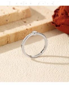 Macro detail of S925 sterling silver bubble ring with round moissanite and pave setting