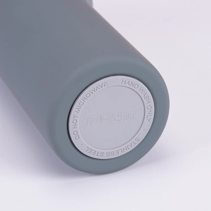 Detail of stainless steel bottle base with hand wash only and no microwave laser engraving