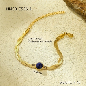 Detail showing a 17+5cm gold snake chain bracelet with a 0.99cm blue lapis lazuli bead