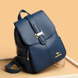 Navy blue faux leather backpack with gold kangaroo logo and magnetic flap closure