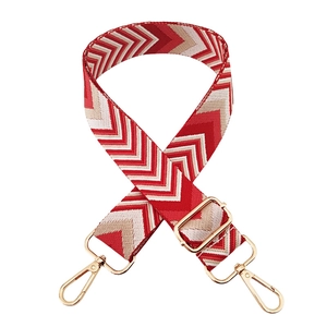 Adjustable wavy pattern shoulder strap with gold metal hardware for crossbody bags