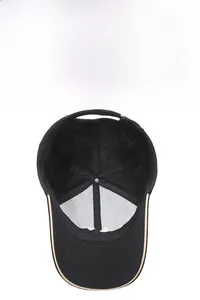 Close-up of black baseball cap interior showing breathable mesh and structural support