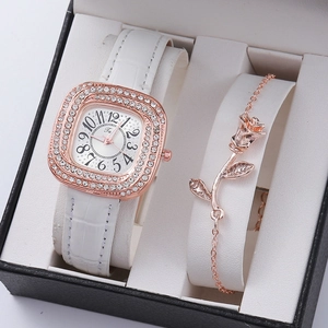 Detail of luxury rose gold square watch with crystal bezel and matching rose bracelet