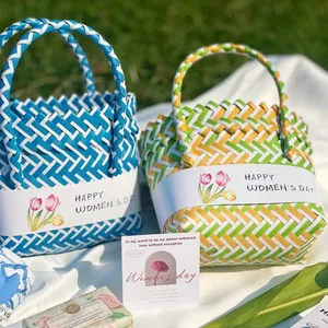 Cute woven gift basket set for women featuring floral designs on an outdoor lawn