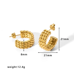 Detail view of gold twisted rope hoop earrings with 21mm size and 12.4g weight measurements