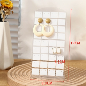 L-shaped acrylic earring display rack dimensions 19cm height by 8.9cm width on wood