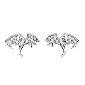 Close-up of silver dragon stud earrings featuring intricate crystal wings and metal craft