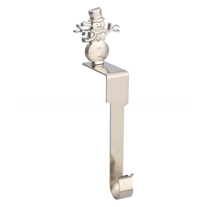 Silver metal Christmas stocking holder with snowman decoration for fireplace mantel