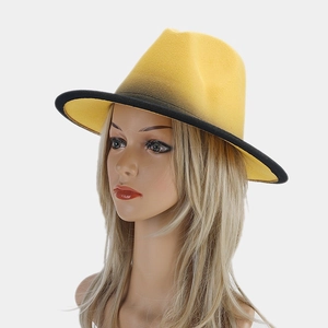 Detail showing the yellow and black ombre gradient on the wool felt fedora hat brim