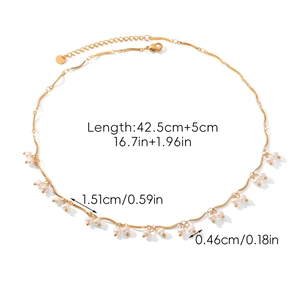 Detail showing wave-textured gold chain necklace with white pearls and size specifications