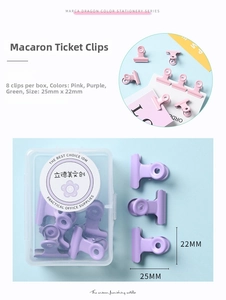 Vue détaillée de pinces à dessin macaron 25mm dans une boîte de rangement