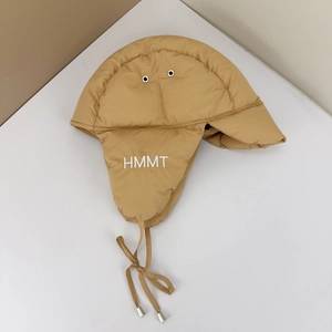 Detail of khaki aviator hat with HMMT embroidery and quilted down-filled texture