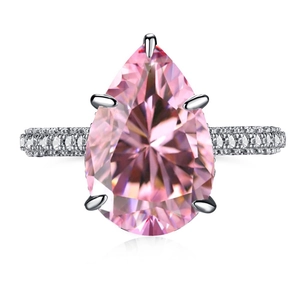 Elegant S925 sterling silver ring with pear-shaped pink gemstone and pave diamonds