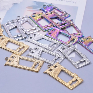 Golden, silver, and iridescent guillotine pendants for DIY necklaces and gothic jewelry