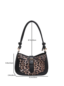Leopard print underarm shoulder bag with black leather trim and gold buckle detail