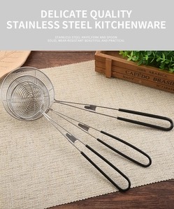 Three-piece stainless steel wire skimmers with black non-slip handles for hot pot cooking