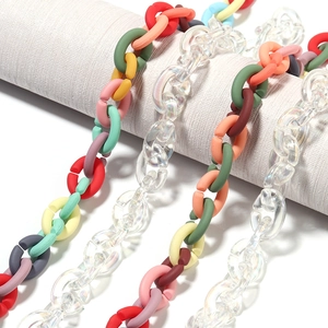 Detail view of colorful acrylic link chains and frosted resin DIY jewelry accessories
