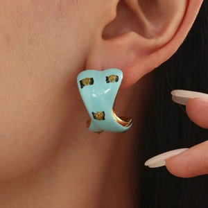 Sky blue C-shaped hoop earrings with colorful enamel glaze and golden glitter accents