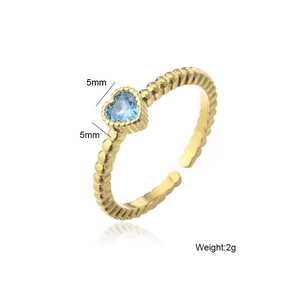 Detail view of 18K gold plated heart ring with blue zircon and 5mm size spec