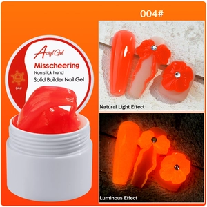 Luminous solid builder nail gel in bright orange showing non-stick texture and glow effect