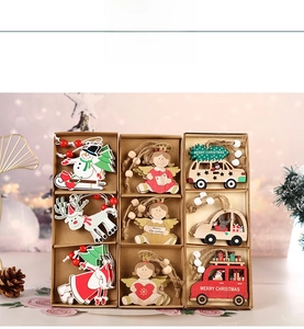 Detail of 9-piece wooden Christmas ornaments set with snowman and reindeer designs