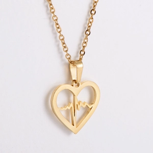 Collier cœur en titane doré avec motif battement de cœur sur une fine chaîne pendante