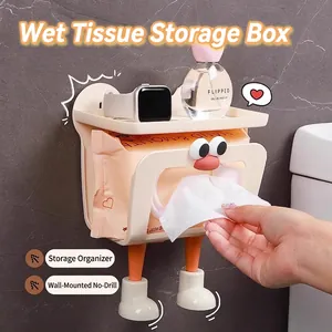 Cream wall-mounted tissue box with cartoon feet and top storage tray for bathroom