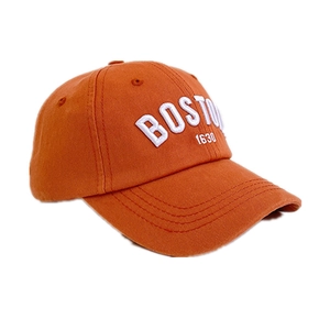 Orange kids baseball cap with white Boston 1630 embroidery on a clean white background