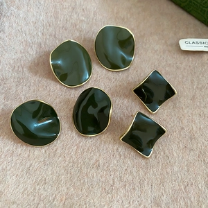 Three pairs of dark green geometric enamel earrings with 14k gold plating and silver pins