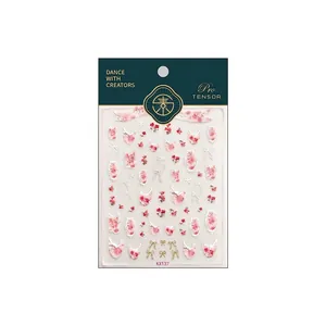 French floral nail stickers with pink petals, white bows and 3D embossed lace design