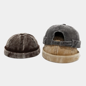 Vintage corduroy docker hats in multiple colors with adjustable metal buckle and rolled brim
