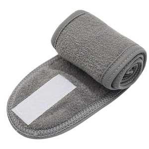 Grey microfiber headwrap with white velcro closure for washing face and yoga